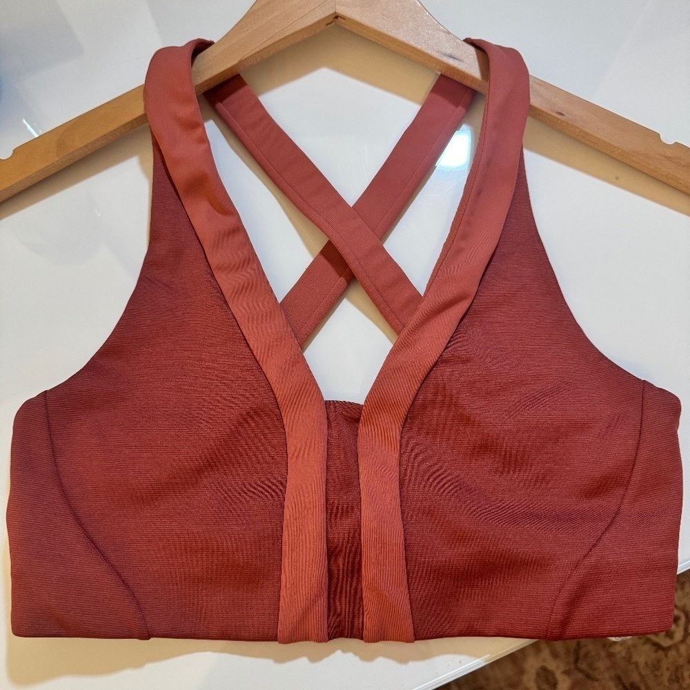 Athleta Allyson Felix Legend V-Neck Sports bra. Size small (A-C). Red/Orange